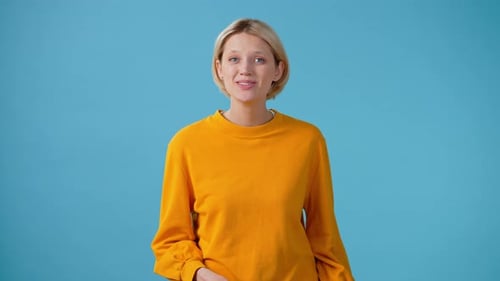 Woman Gives Thumbs Up and Positive Gestures