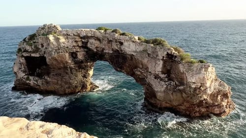 Es Pontas Natural Rock Arch in Santanyi, Mallorca at Sunset