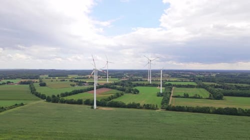 Wind turbines next to highway