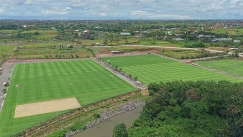 Aerial view of bali united training center soccer fields