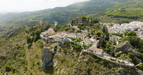 Rising Aerial Drone Shot Over Hill Top Village In Spain
