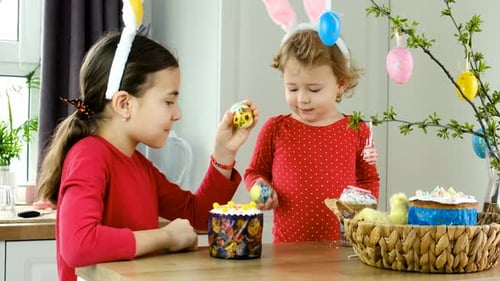 Children with Easter Eggs at Home Selective Focus