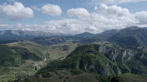 Beautiful Areal shot of Mountain landscape in summer with a cloudy sky