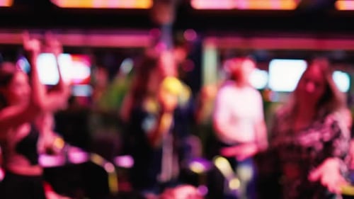 Blurred People Dancing in a Nightclub or Bar