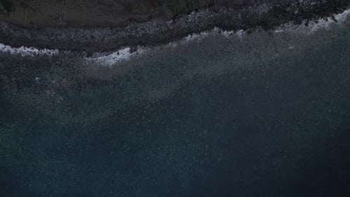 Waves shore rocks