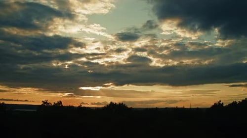 Time Lapse of Clouds at Golden Sunset