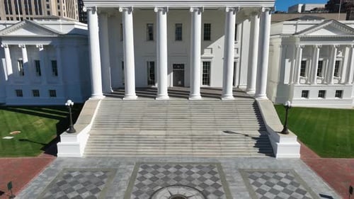 Virginia State Capitol in Richmond, VA, showcasing its neoclassical architecture with iconic white c
