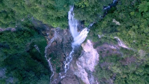 Aerial View Waterfall of Mountain Falling in Green Nature of Forest Landscape