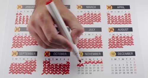 Crossing Out Days on Calendar Page