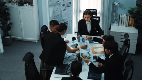 Top view of skilled businesspeople working together at meeting. Directorate.