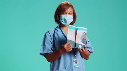 Nurse Presenting Medical Brochure