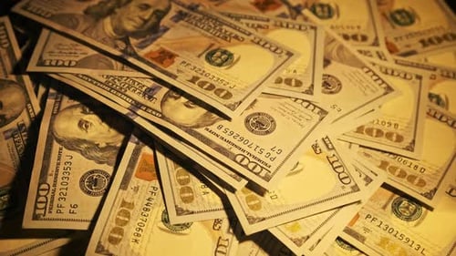 Pile of United States One Hundred Dollar Bills