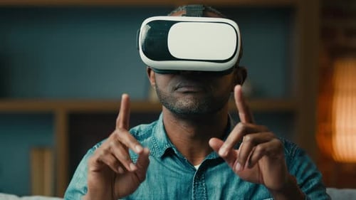 Man Uses VR Headset at Home