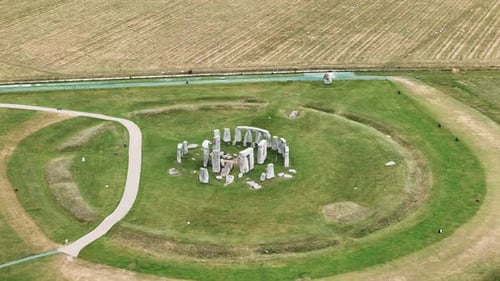 Stonehenge iconic prehistoric megalithic structure in Wiltshire, England, aerial orbiting shot
