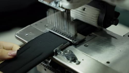 Industrial Sewing Machine Works in Textile Production Concept of Sewing Machine Operation