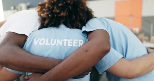 Volunteer group, team building and charity, community in huddle and mission with energy