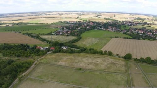 Aerial View From a Drone Buildings of a Picturesque Village Surrounded By Fields in a Rural Area