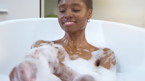 Woman Relaxing in Bubble Bath, Self Care