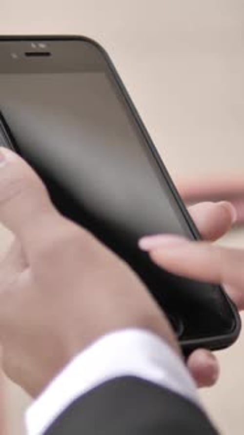 Woman Using Mobile Phone, Touching Screen, Wearing Blazer