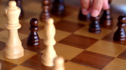 Yuriy Chess pieces. Chess board from hard strategy logic game.