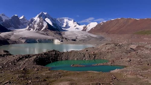 Glacial lakes with stunning snow-capped mountains and glaciers