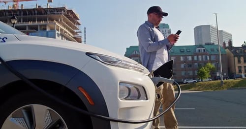 Electric Vehicle Charging Port Plugging in EV Modern Car
