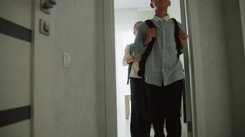Children with Backpacks Leaving Home