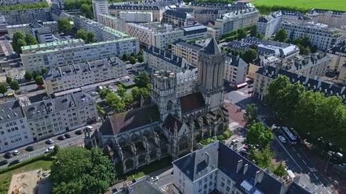 Church of Saint Jean as known as the Leaning Church, Caen, France. Aerial drone backward