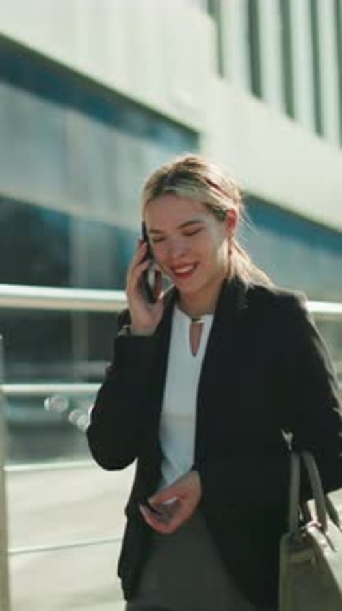 Professional Business Lady Smiling on Phone Call While Walking Home Urban Area