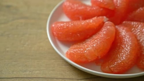 Grapefruit Slices on a Plate