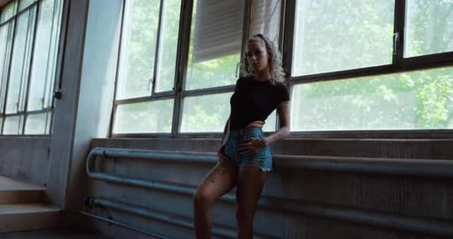Stylish Woman Posing by Windows Indoors
