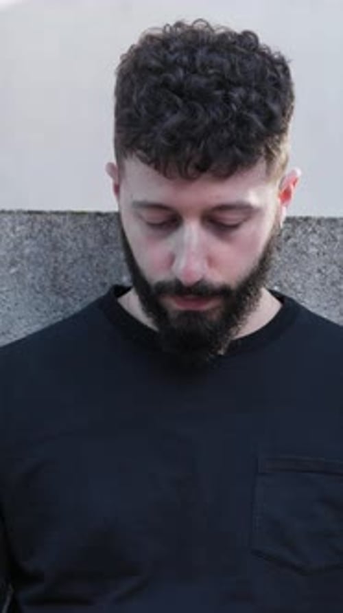 Young Adult Reads Ancient Leather Book Indoors