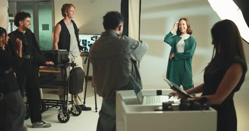 Project, photographer and camera with people in studio for ecommerce catalog, production and model