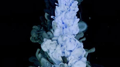 SlowMotion Reveals Blue Paint Dancing in Water Crafting a Vivid Colorful Cloud on Black