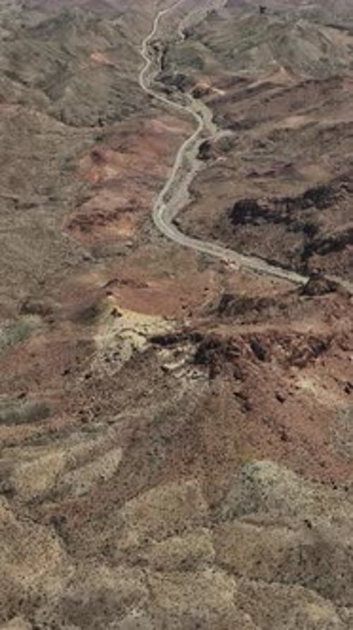 Aerial view of the rugged terrain in Nevada, showcasing the vast landscape