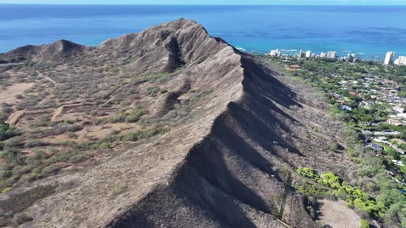 Aerial drone footage along the rim of Diamond Head volcanic crater on ...