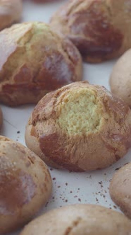 Freshly Baked Bread Rolls From Local Bakery in Warm Kitchen