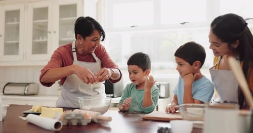 Family Baking Together in Bright Home Kitchen