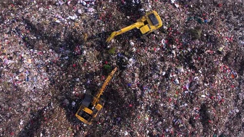Aerial View of Excavators Working at Garbage Dump