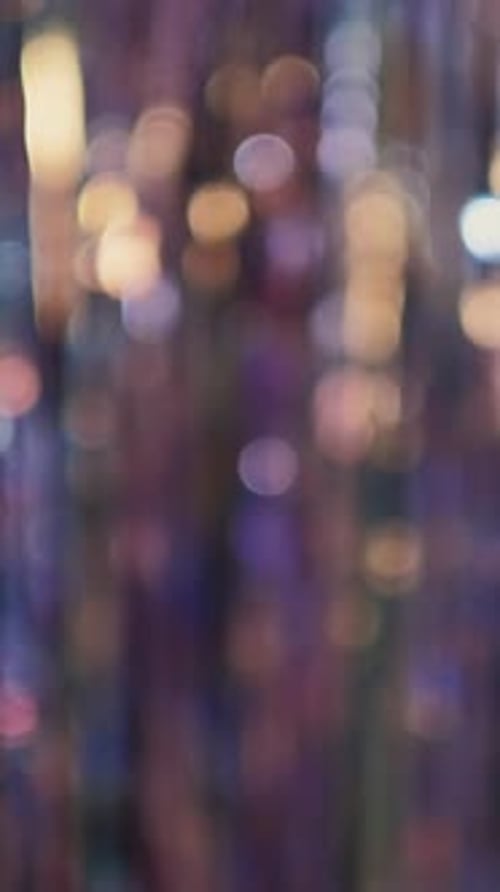 Fond festif scintillant avec lumière bokeh verticale