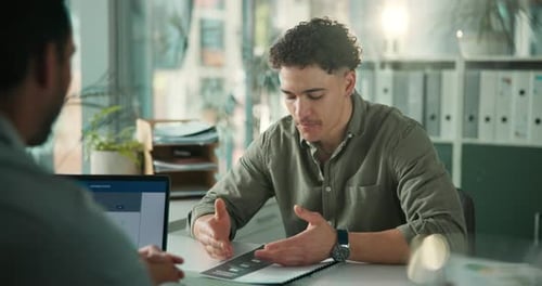 Manager, men and discussion with document in office, performance review and employee evaluation