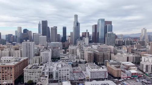 Establishing Drone Shot Of East Downtown Los Angeles With West Skyline View.
