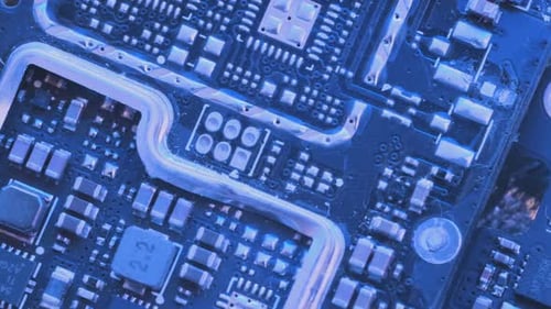 Microchips top view in blue light, CPU processor. Computer motherboard components. PC chip