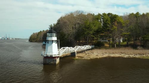 Scenic Aerial Footage of Doubling Point Lighthouse with Bath Iron Works visible in background, Arrow