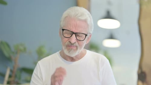 Senior Man Suffering Intense Toothache Pain