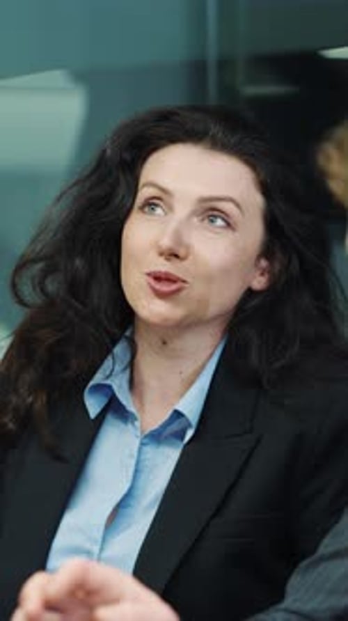 Businesswoman in Corporate Meeting in Modern Office