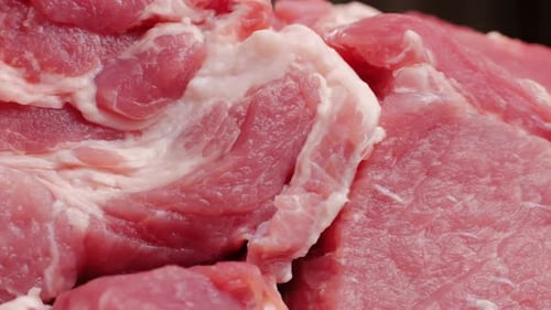 Chef Butcher Cutting Pork Meat with Knife on Kitchen Cooking Mexican Traditional Food Man Cut Big