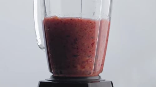 Electric Shaker Mixing Smoothie in Super Slow Motion Close Up