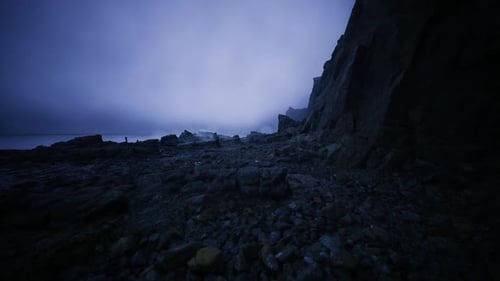Nighttime Rugged Terrain Scene Foreboding Mountain Slope Under Moonlight