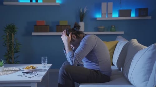 Frustrated and nervous young man getting angry with himself.